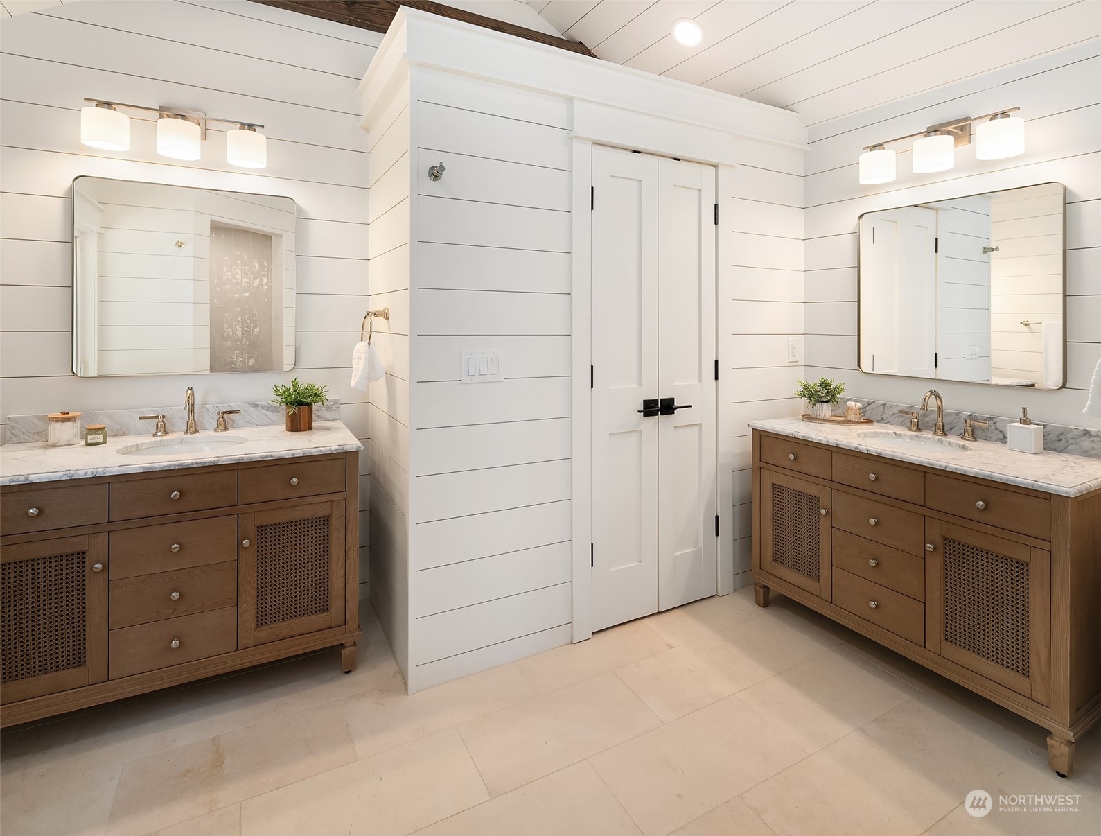 4528 Southwest Luana Beach Road Vashon, WA 98070 - Photo 13 of 27 a spacious bathroom with double sink and a mirror