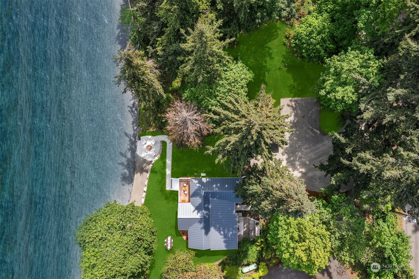 4528 Southwest Luana Beach Road Vashon, WA 98070 - Photo 21 of 27 an aerial view of a house with a yard