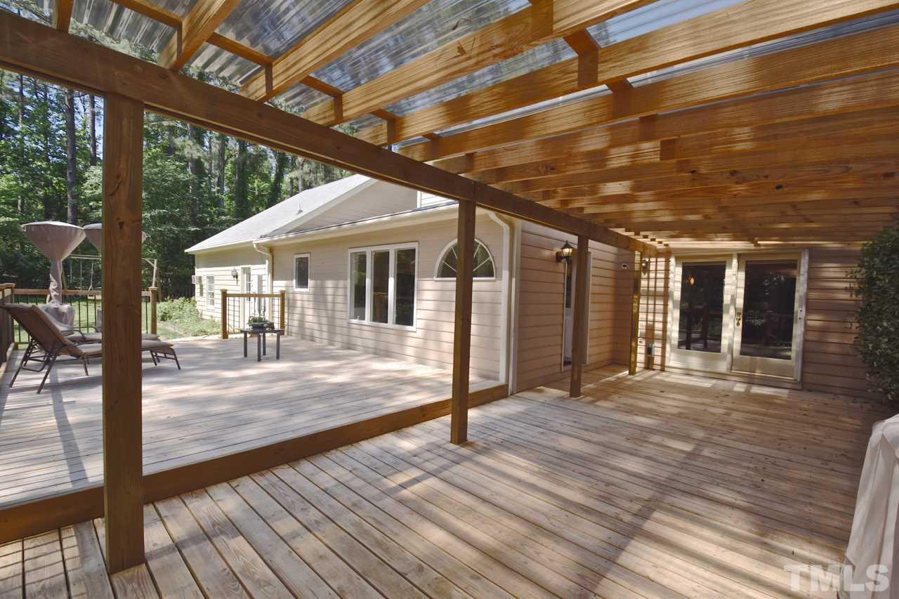 4213 Tolchester Place Raleigh, NC 27613 - Photo 23 of 25 a porch with seating space