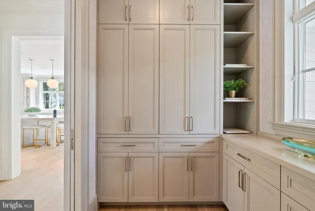 view of kitchen with granite countertop cabinets and white appliances