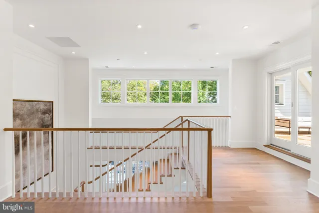 a view of entryway with wooden floor