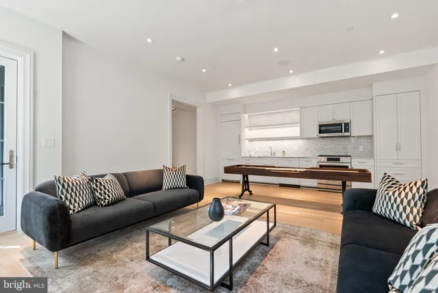 a living room with furniture and a couch