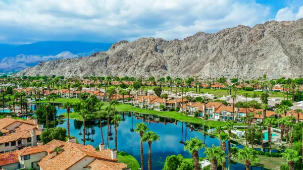 a view of a houses with a yard