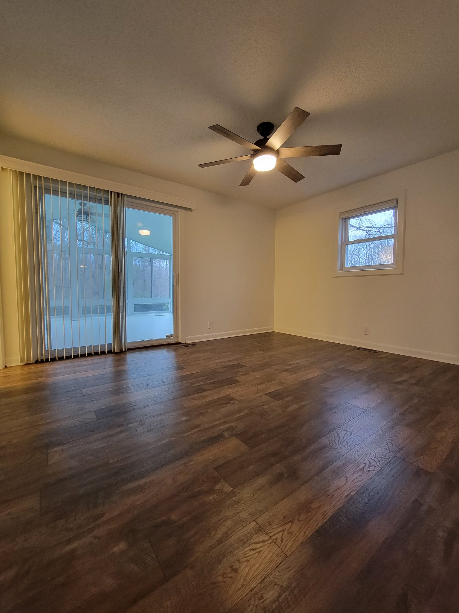 791 Jason Chapel Road Dickson, TN 37055 - Photo 24 of 27 a view of an empty room with wooden floor and a window