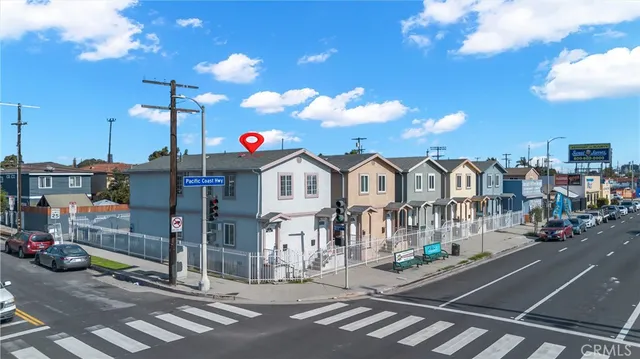 a front view of a building with street view