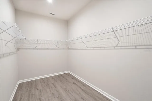 a view of a room with racks on the wall