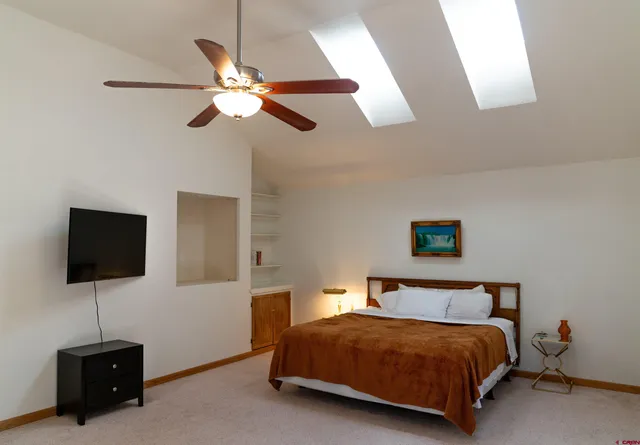 a room with a dresser and a wooden floor