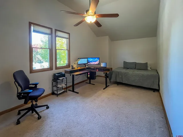 a bathroom with a shower and a toilet