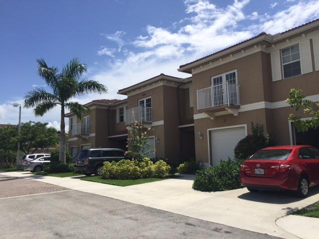 10336 Southwest Sandalfoot Boulevard, Unit 9 Boca Raton, FL 33428 - Photo 1 of 7 Front of Building