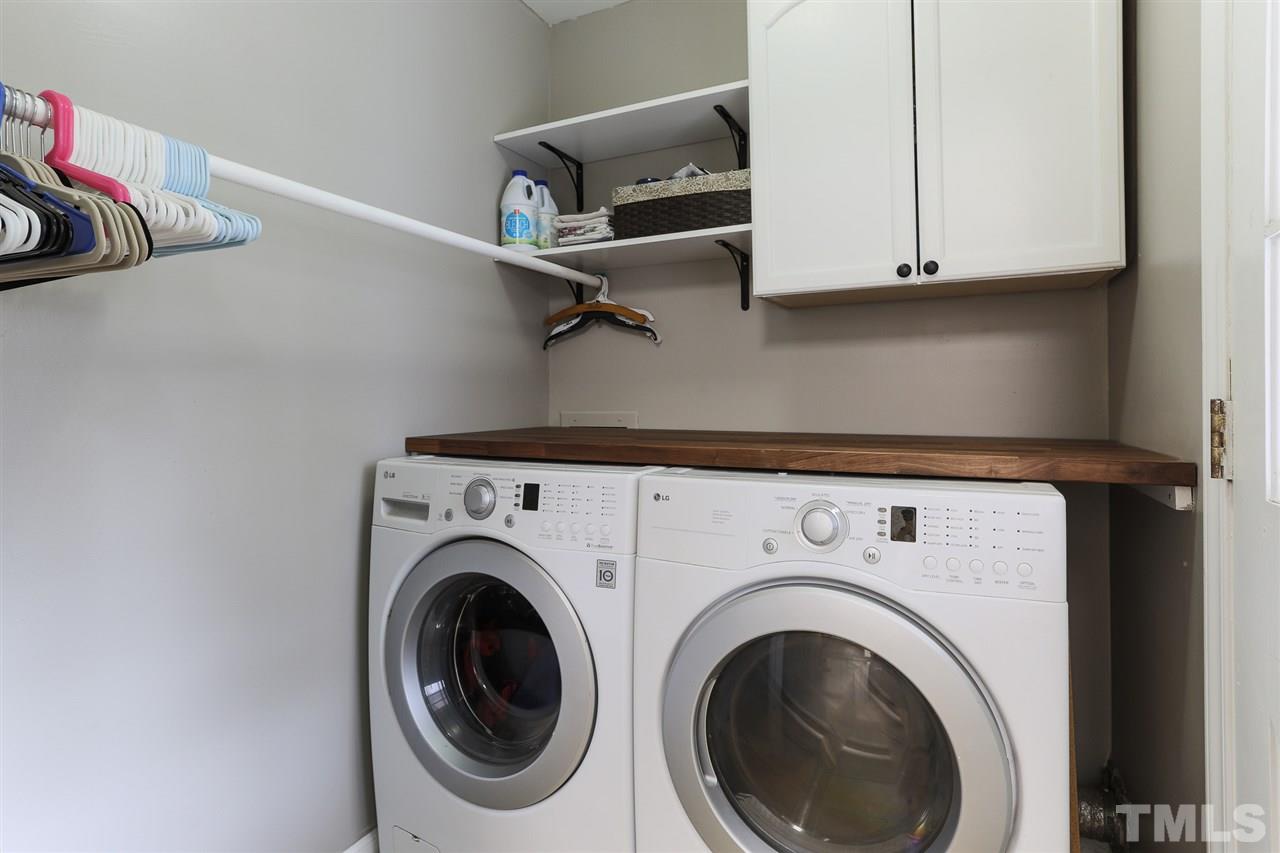 7613 Leesville Road Raleigh, NC 27613 - Photo 16 of 30 a utility room with dryer and washer