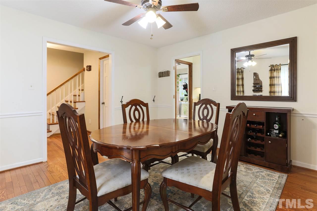 7613 Leesville Road Raleigh, NC 27613 - Photo 18 of 30 a view of a dining room with furniture
