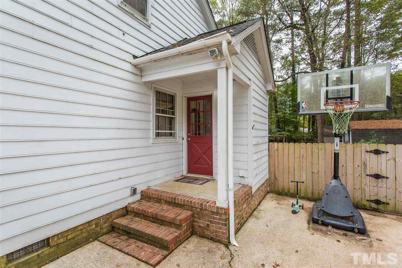 7613 Leesville Road Raleigh, NC 27613 - Photo 28 of 30 a view of house with wooden fence
