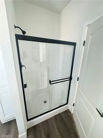 a white refrigerator freezer and a window in a room