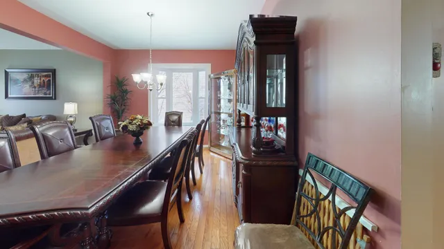 a view of a livingroom with furniture and a flat screen tv