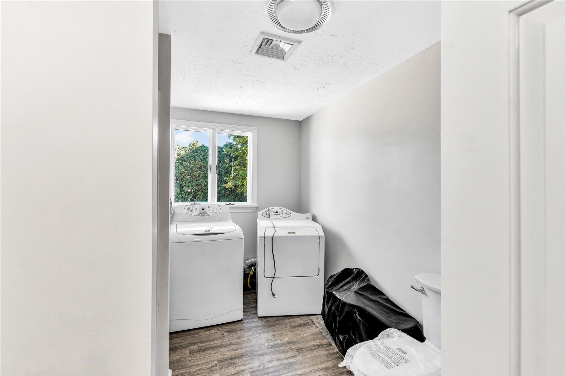 19 Mashnee Road Bourne, MA 02532 - Photo 25 of 46 a utility room with dryer and washer