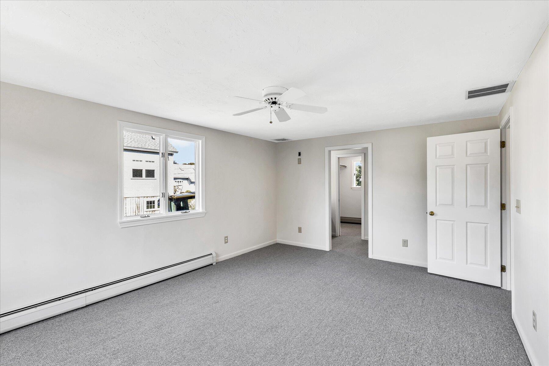 19 Mashnee Road Bourne, MA 02532 - Photo 29 of 46 an empty room with windows and cabinet