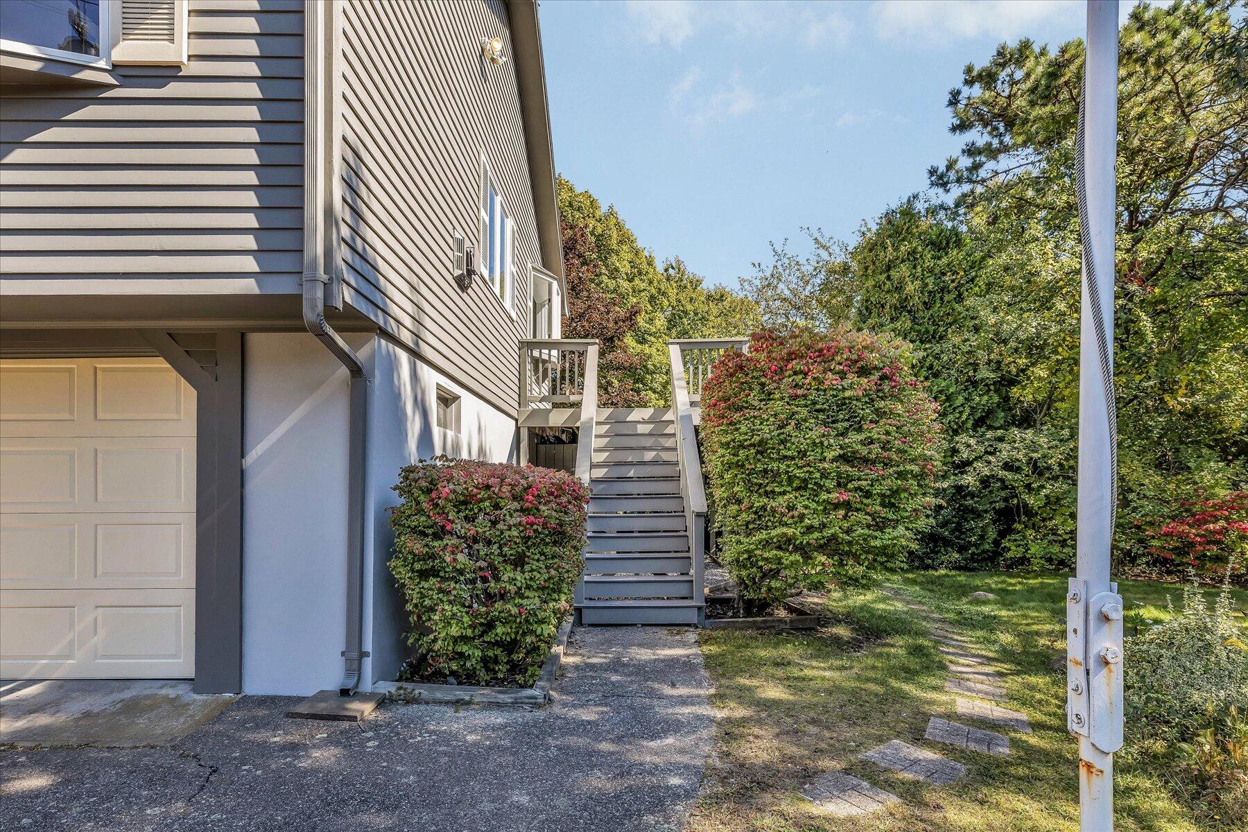 19 Mashnee Road Bourne, MA 02532 - Photo 35 of 46 a view of a house with a yard