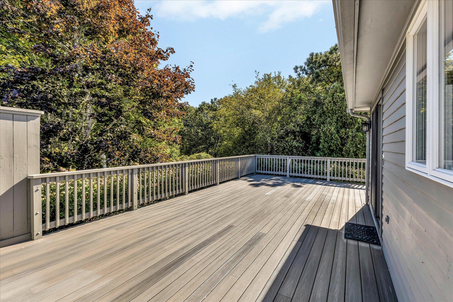 19 Mashnee Road Bourne, MA 02532 - Photo 42 of 46 a view of balcony with wooden floor and fence
