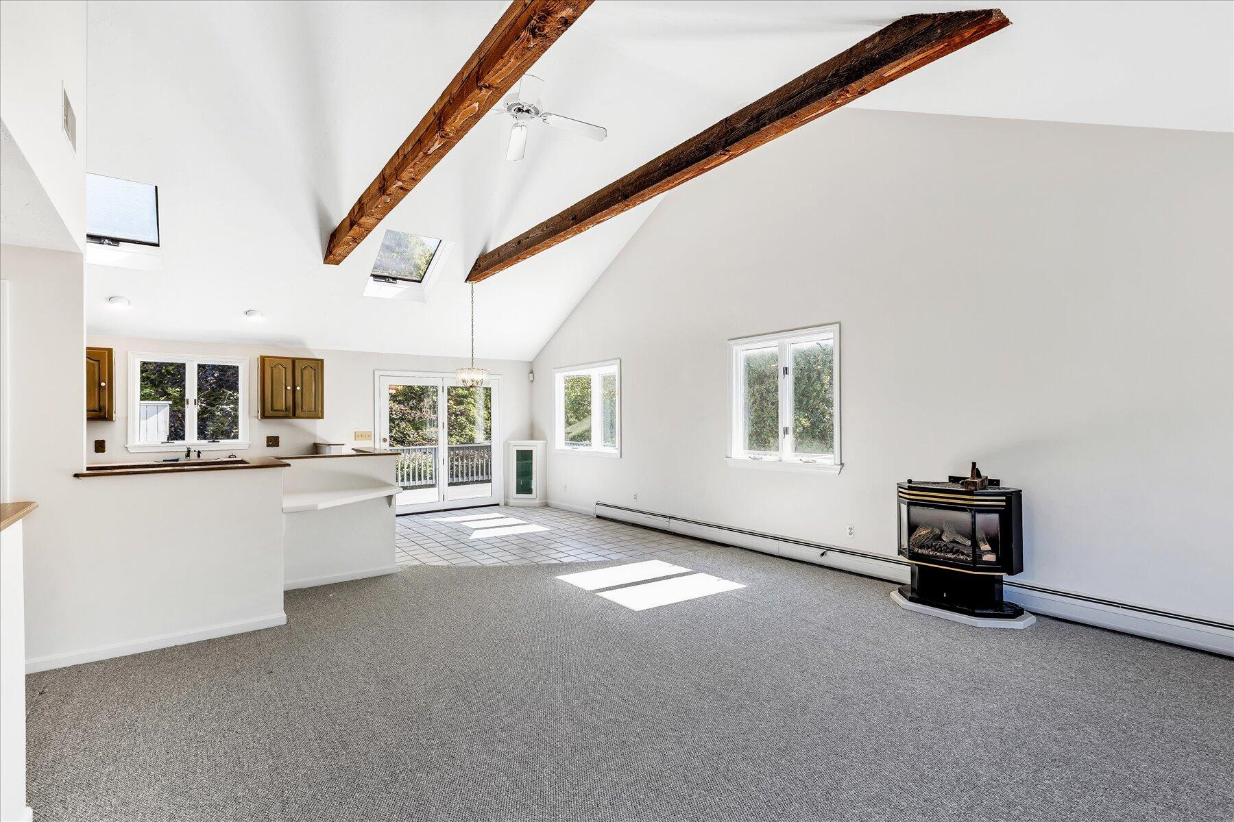 19 Mashnee Road Bourne, MA 02532 - Photo 9 of 46 a view of a livingroom with furniture and a window