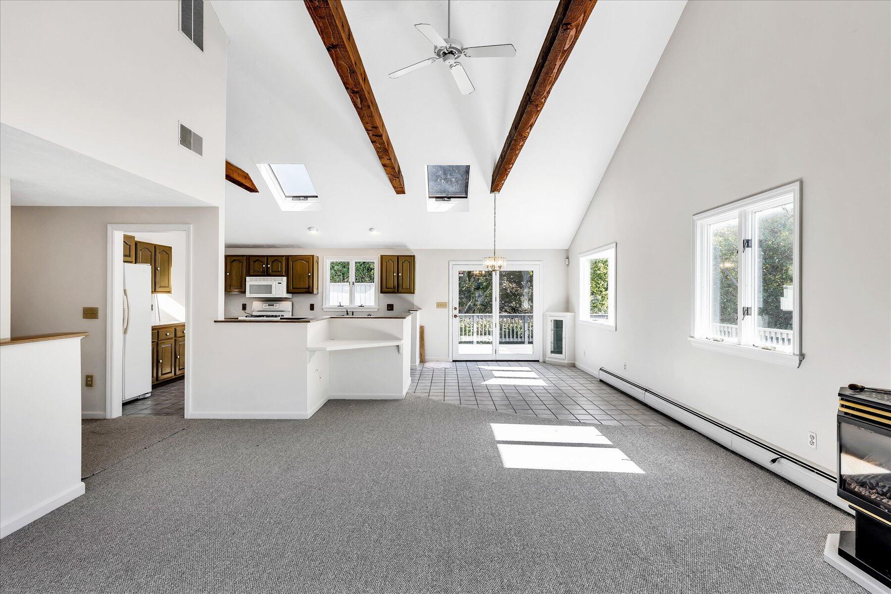 19 Mashnee Road Bourne, MA 02532 - Photo 10 of 46 a view of living room with furniture and window