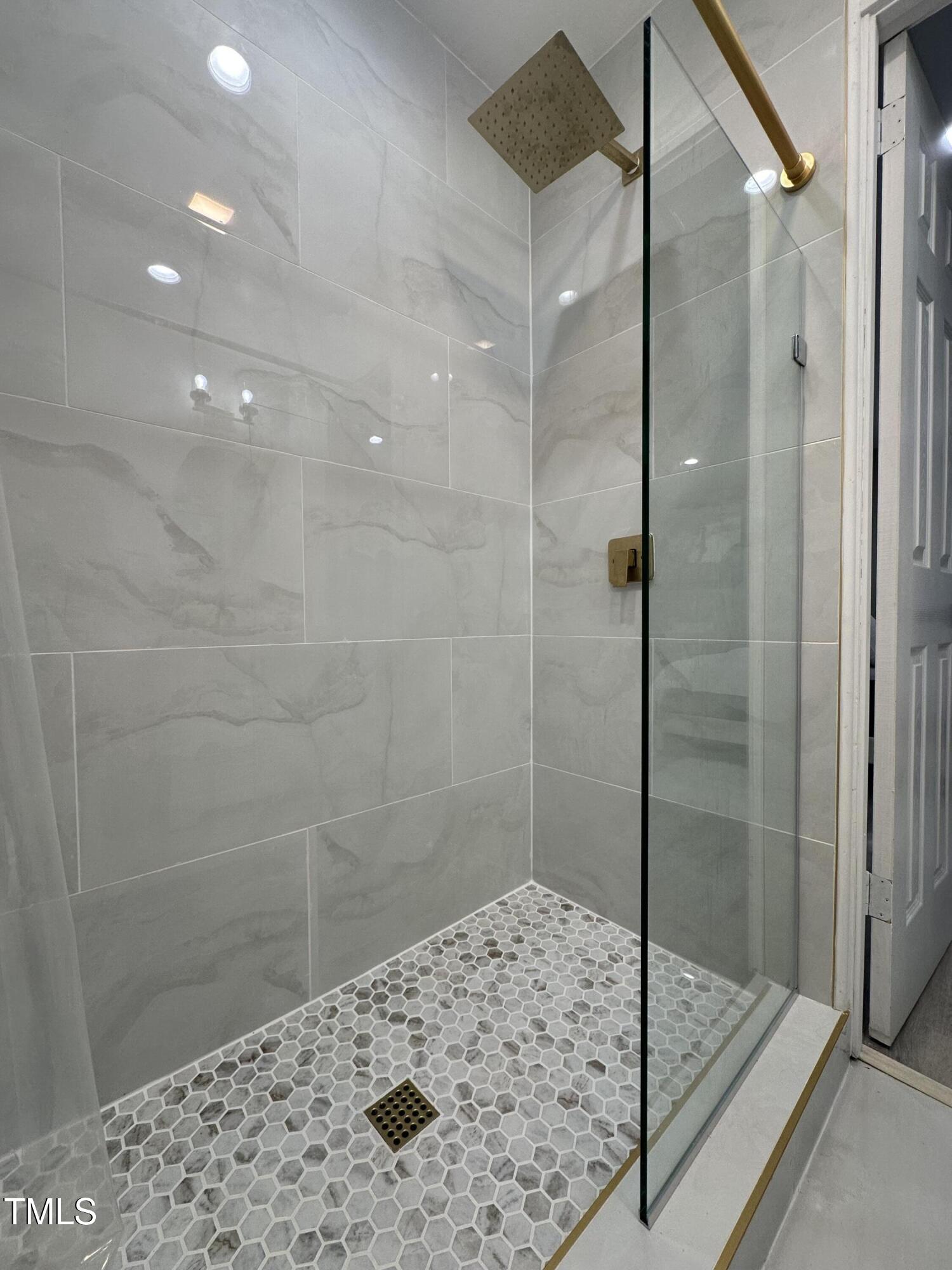 1216 Elizabeth Road West Wilson, NC 27893 - Photo 11 of 34 a bathroom with a shower and a sink