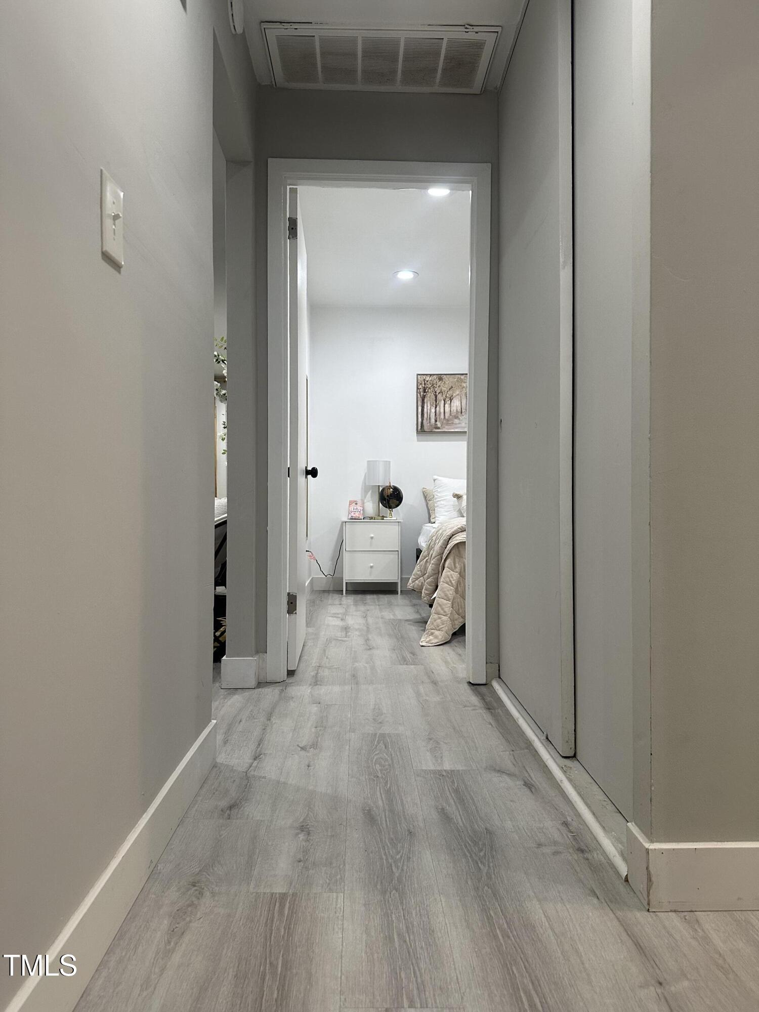 1216 Elizabeth Road West Wilson, NC 27893 - Photo 18 of 34 a view of a livingroom and a hallway