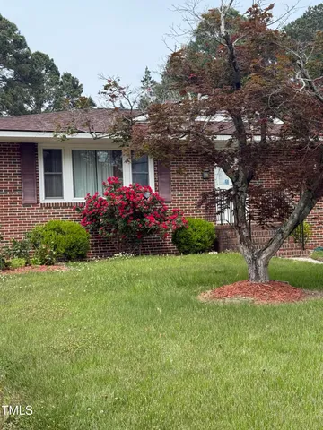 a front view of house with yard