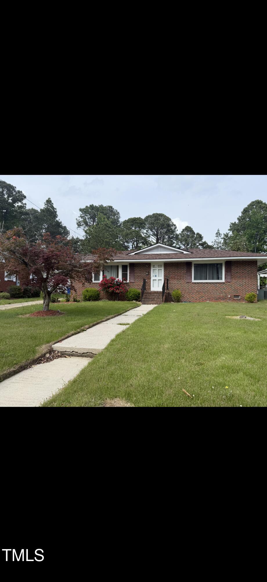 1216 Elizabeth Road West Wilson, NC 27893 - Photo 3 of 34 a view of a lake with houses with lake view