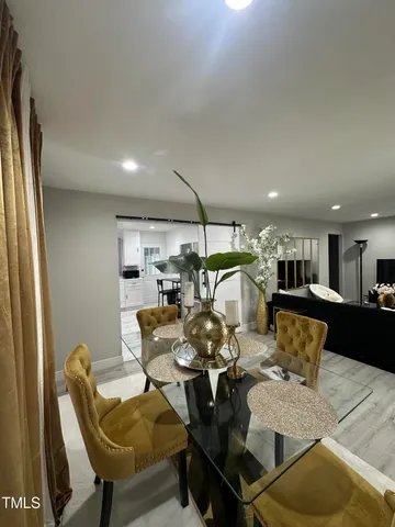 a view of a dining room with furniture