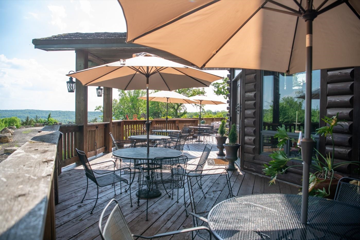 2003 West Hanover Road Hanover, IL 61041 - Photo 47 of 61 a view of a patio with chairs and table under an umbrella