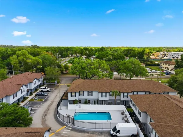 an aerial view of a house with a garden