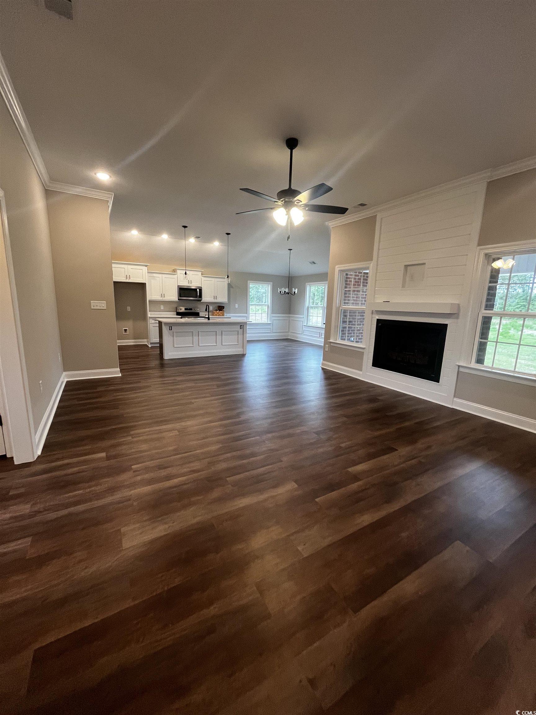 3424 Asbury Road Aynor, SC 29511 - Photo 2 of 10 Unfurnished living room featuring ornamental moldi