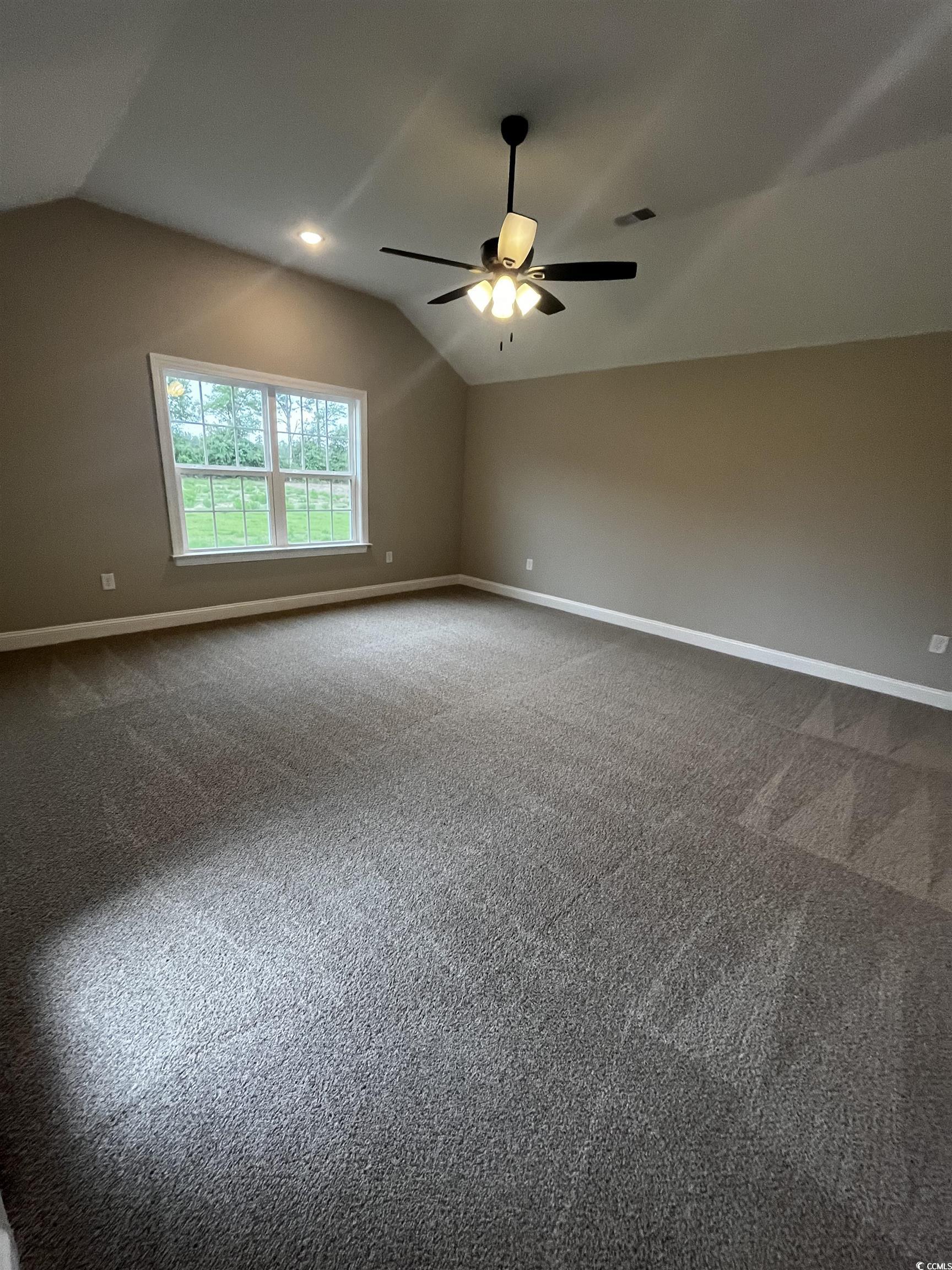 3424 Asbury Road Aynor, SC 29511 - Photo 8 of 10 Empty room featuring vaulted ceiling, baseboards,