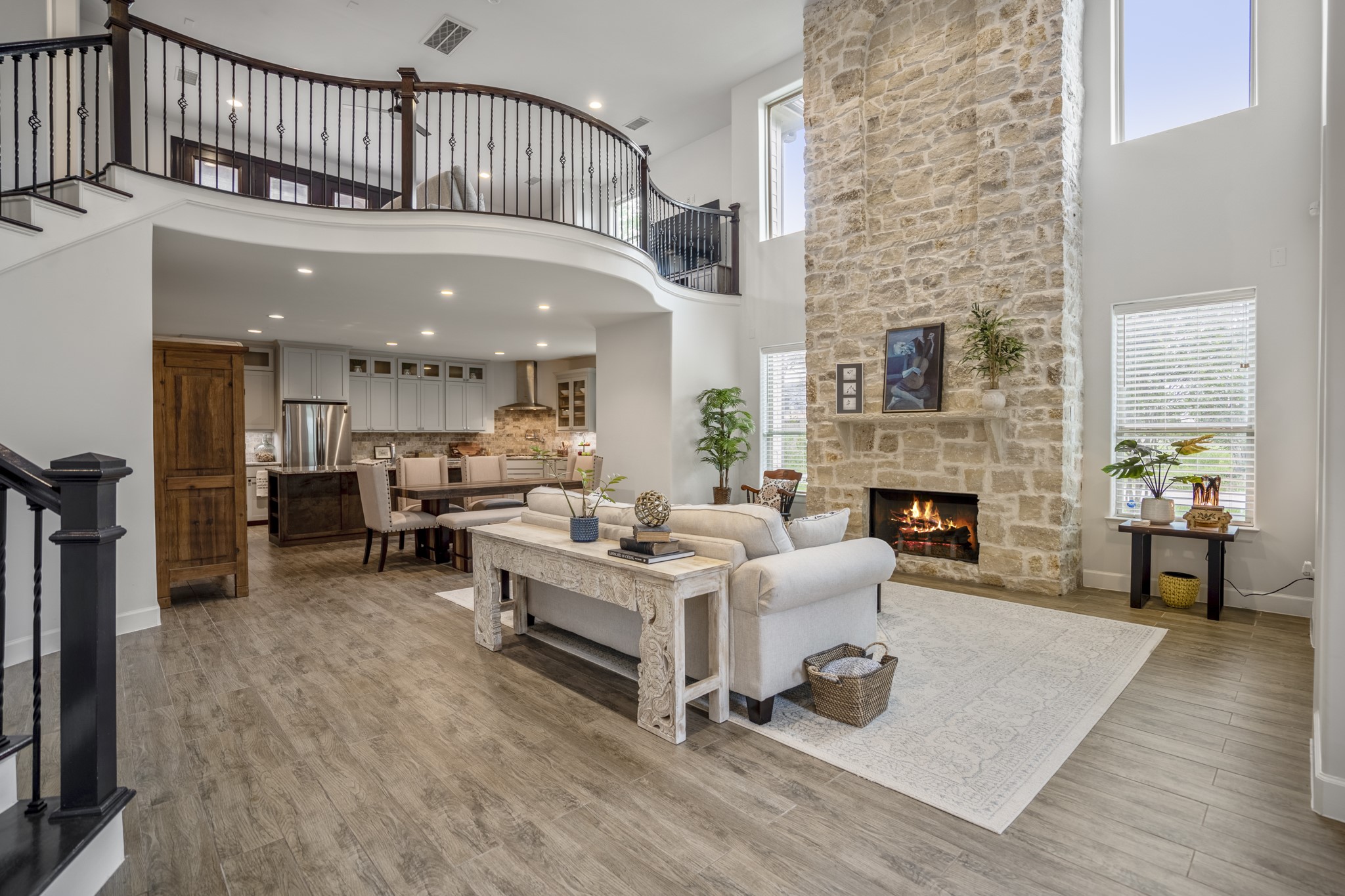 3202 Ozark Street Houston, TX 77021 - Photo 7 of 31 The dramatic floor to ceiling stone fireplace is the focus of the living room.
