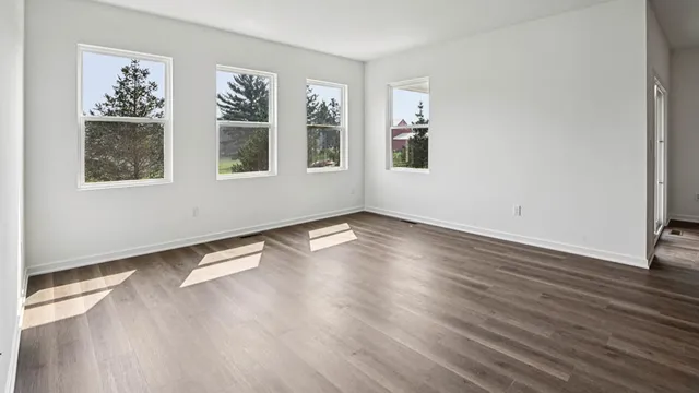 an empty room with windows