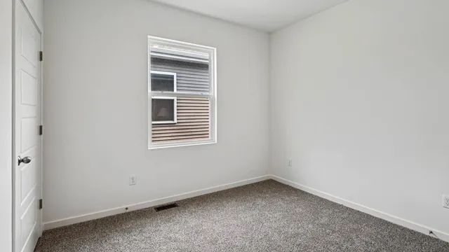 an empty room with a window
