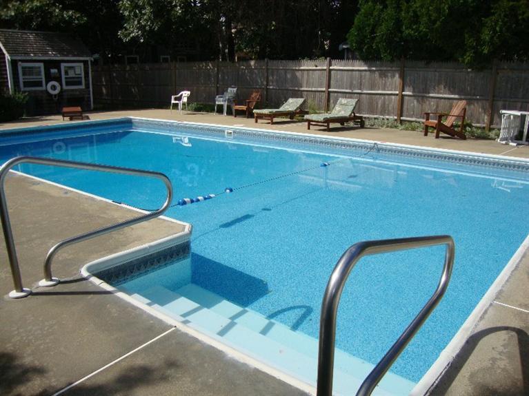 67 Inman Road, Unit F Dennis Port, MA 02639 - Photo 2 of 11 a view of a terrace with seating area
