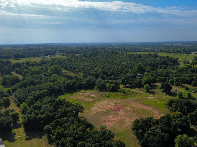 Pleasant Ridge Jones, OK 73049 - Photo 15 of 21 Expansive acreage featuring abundant mature trees and open clearings