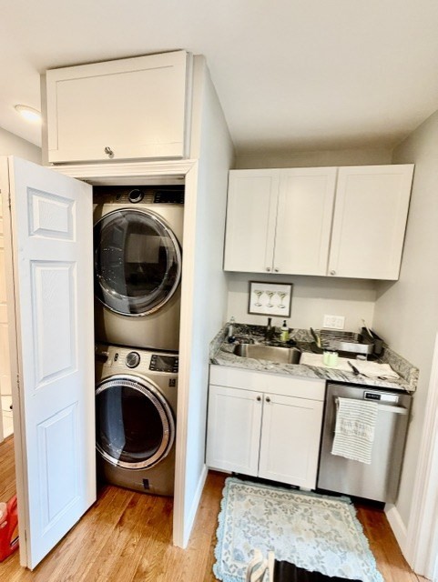14 Cleveland Place, Unit 3 Boston, MA 02113 - Photo 5 of 22 a kitchen with a stove top oven sink and cabinets