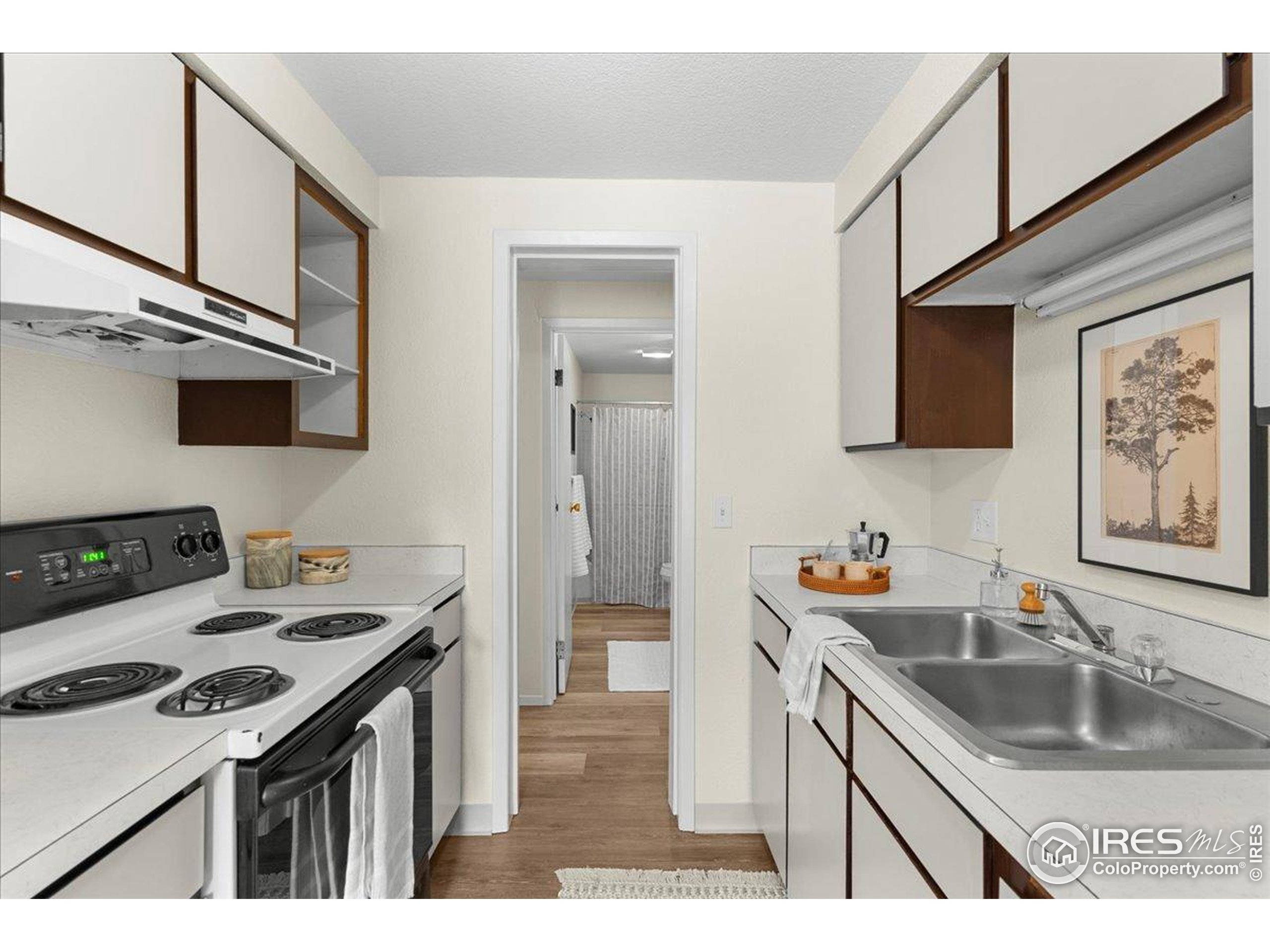 1204 Pomona Street, Unit S & T Fort Collins, CO 80521 - Photo 14 of 40 a kitchen that has a sink and a stove