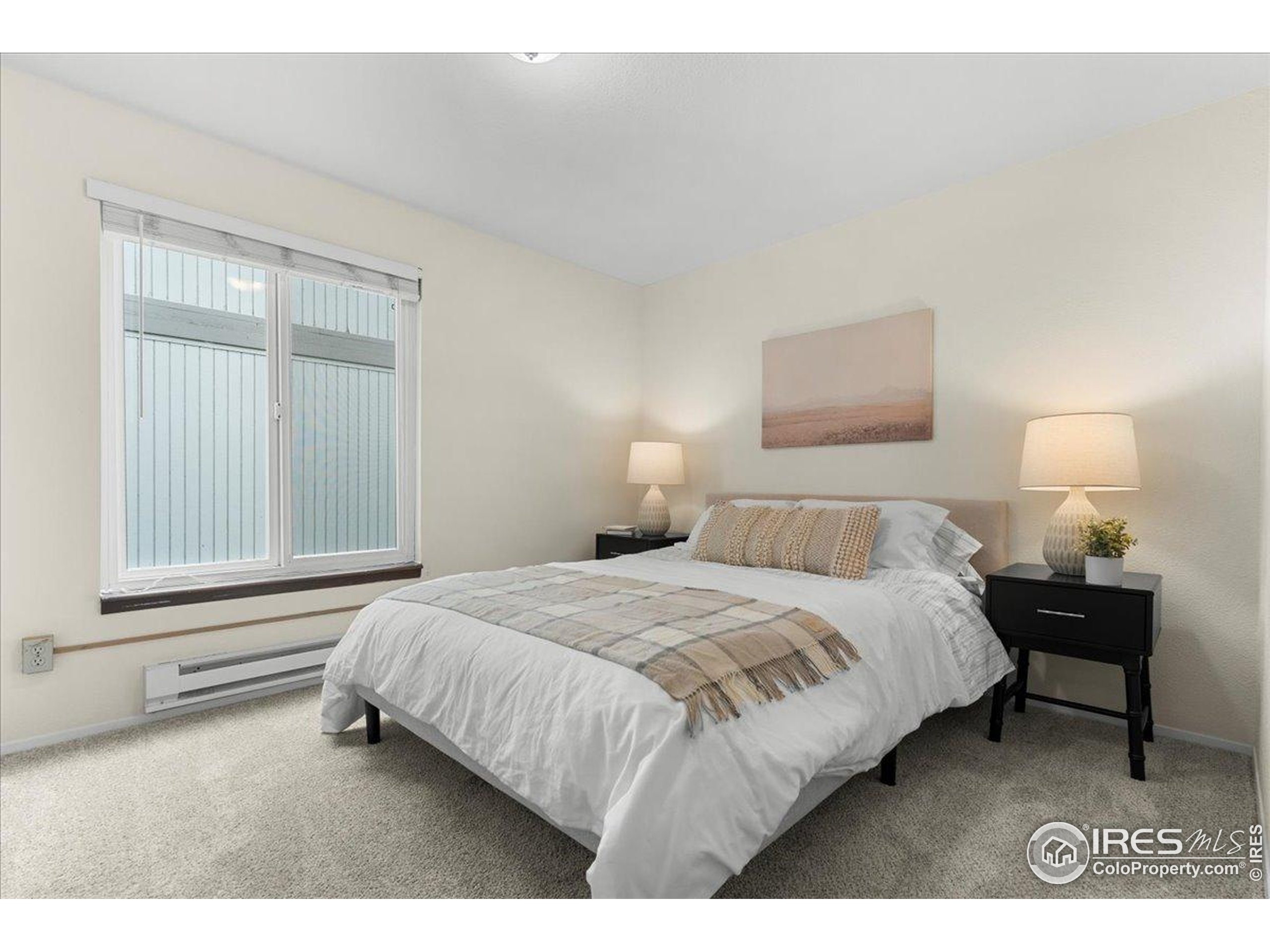 1204 Pomona Street, Unit S & T Fort Collins, CO 80521 - Photo 20 of 40 a bedroom with a bed and window