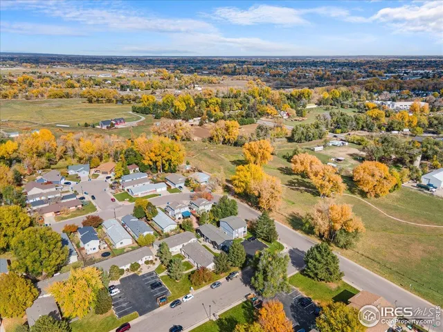 an aerial view of a house with outdoor space