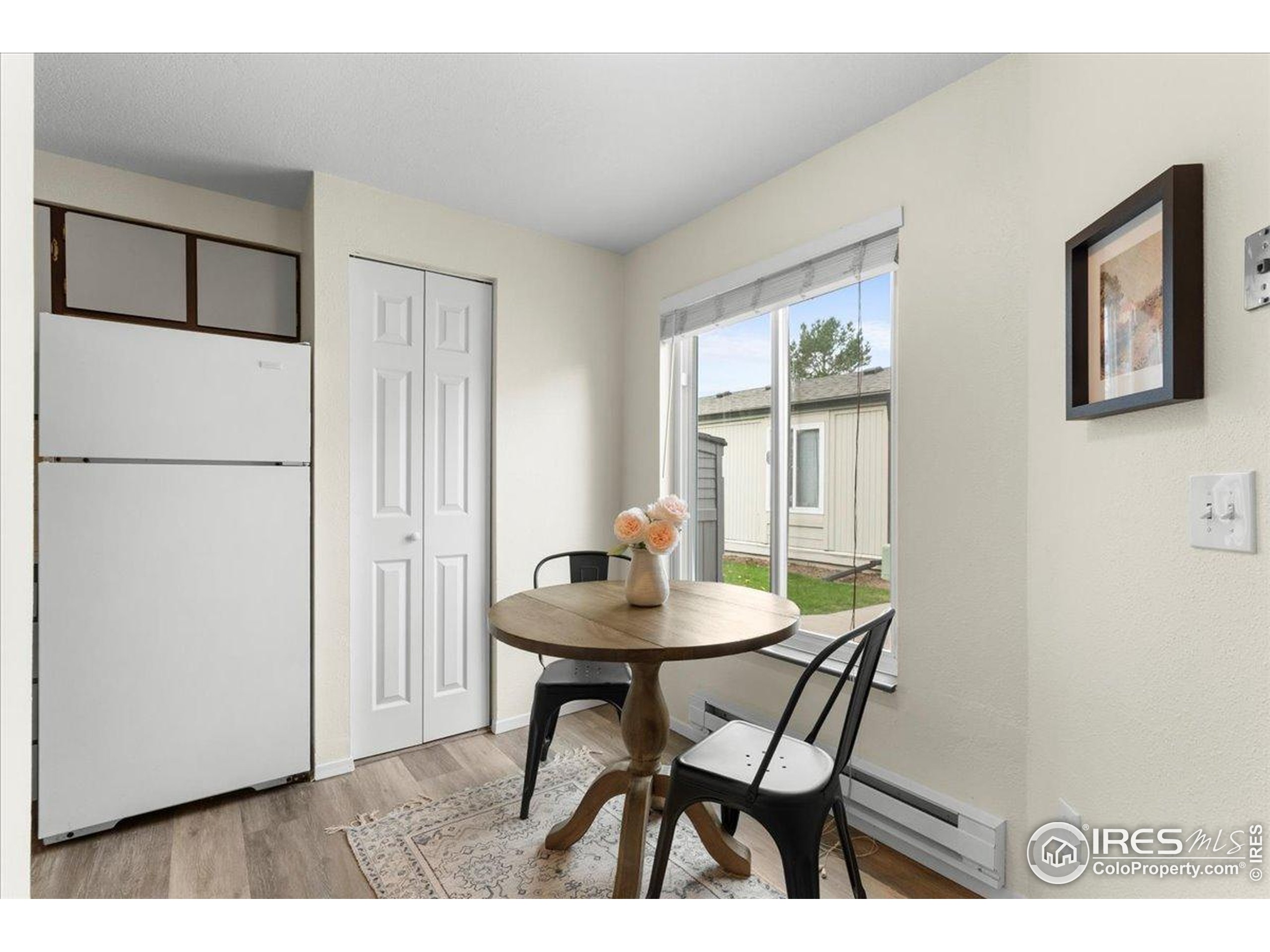 1204 Pomona Street, Unit S & T Fort Collins, CO 80521 - Photo 9 of 40 a dining room with furniture and window
