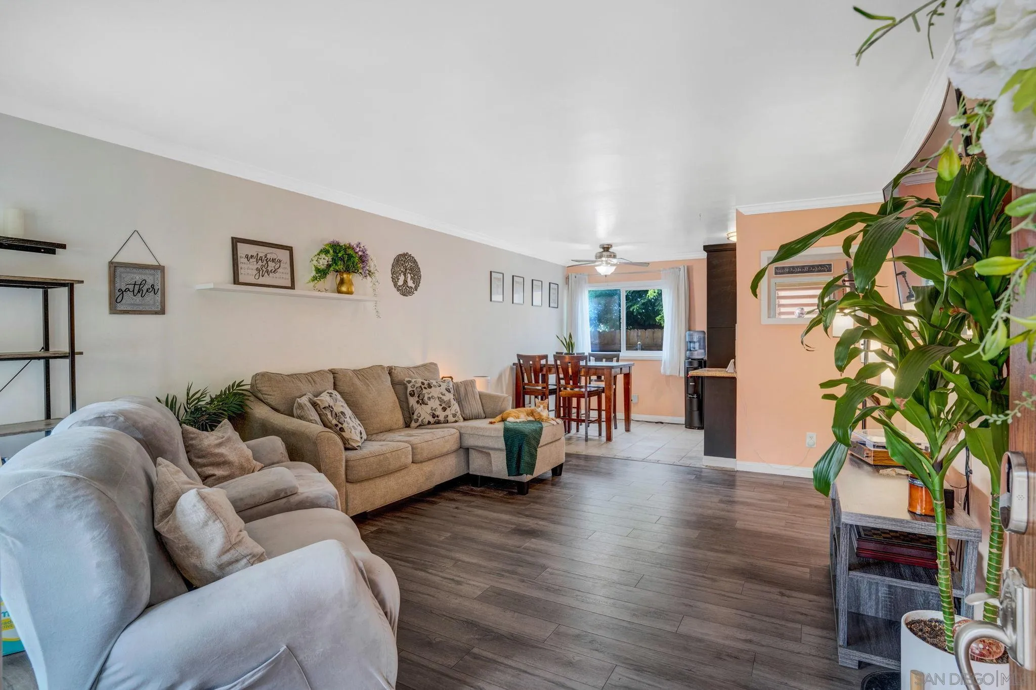 575 7th Street, Unit 104 Imperial Beach, CA 91932 - Photo 1 of 23 a living room with furniture and a wooden floor