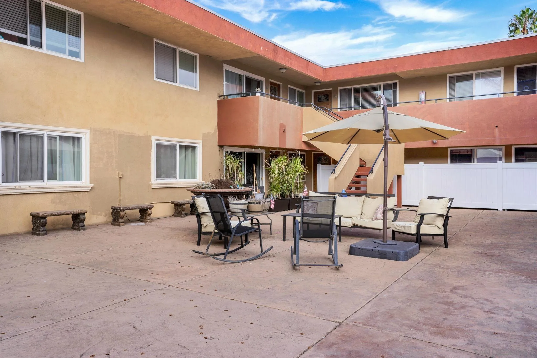 575 7th Street, Unit 104 Imperial Beach, CA 91932 - Photo 17 of 23 a view of a house with backyard and sitting area