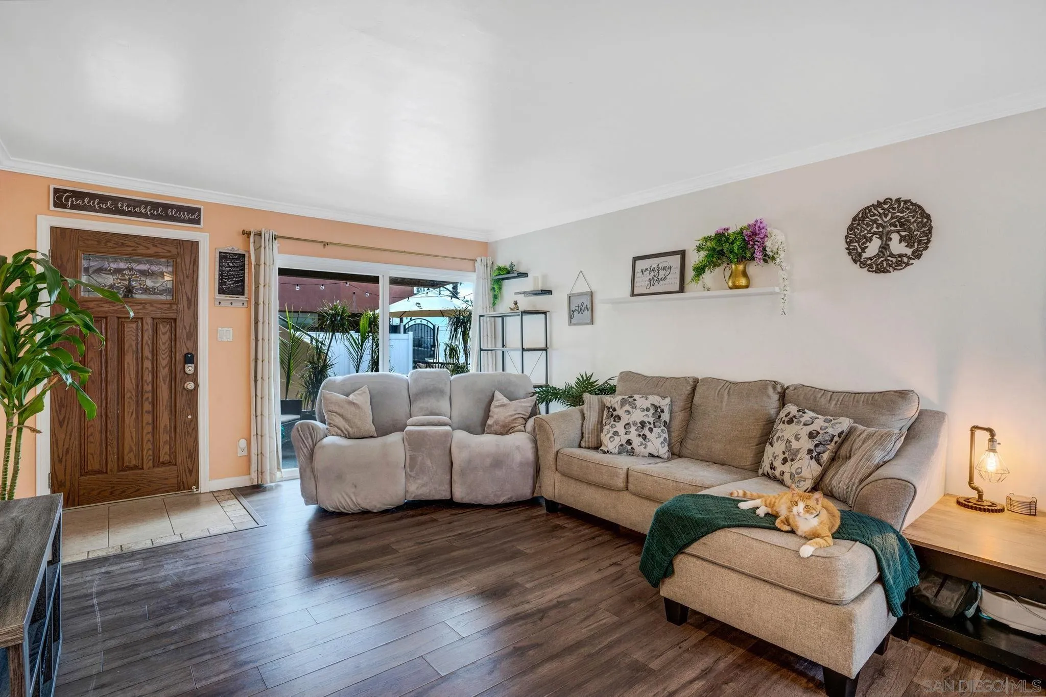 575 7th Street, Unit 104 Imperial Beach, CA 91932 - Photo 2 of 23 a living room with furniture and a wooden floor