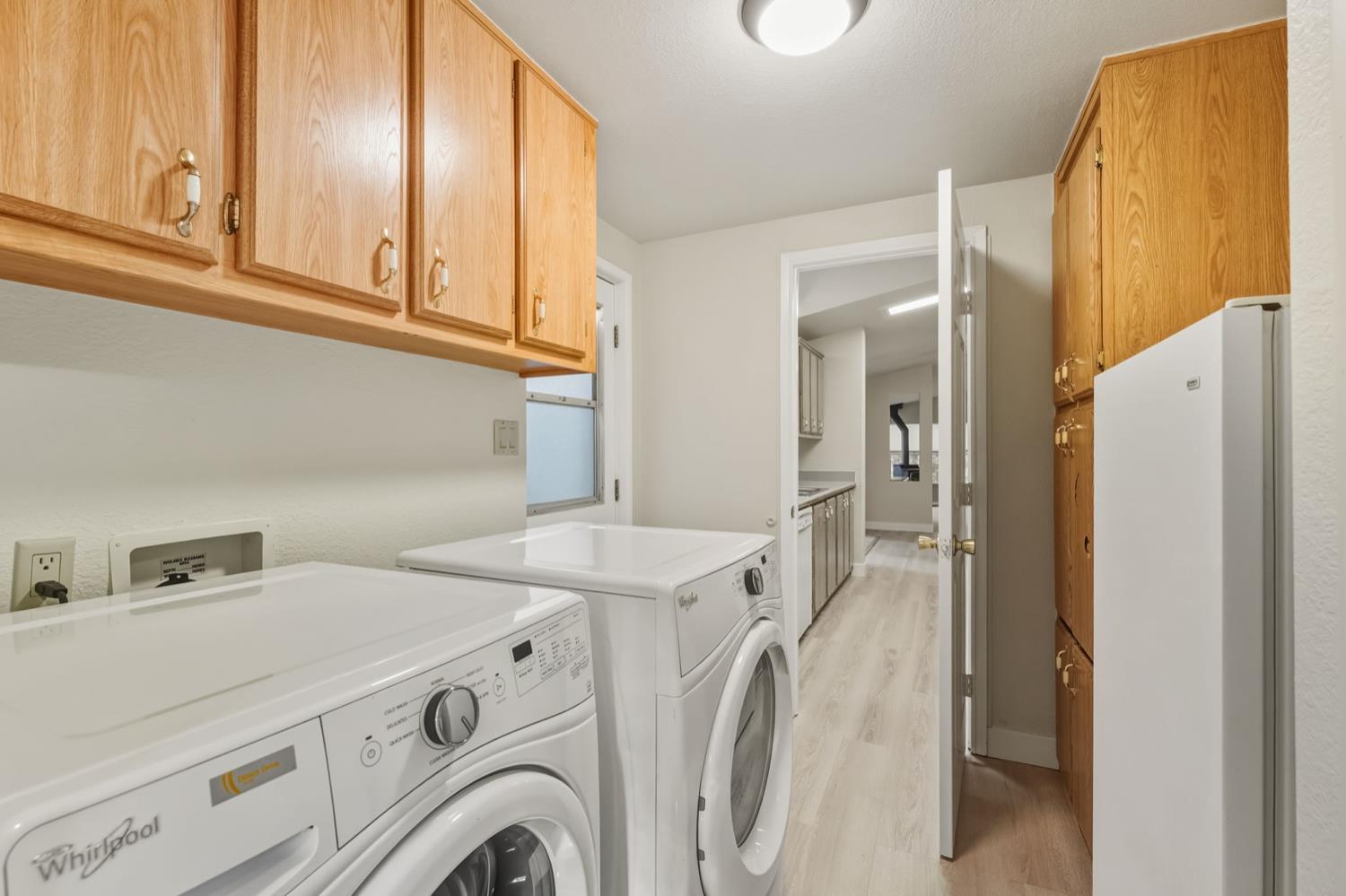 5819 Lynx Trail Pollock Pines, CA 95726 - Photo 18 of 34 a utility room with dryer and washer