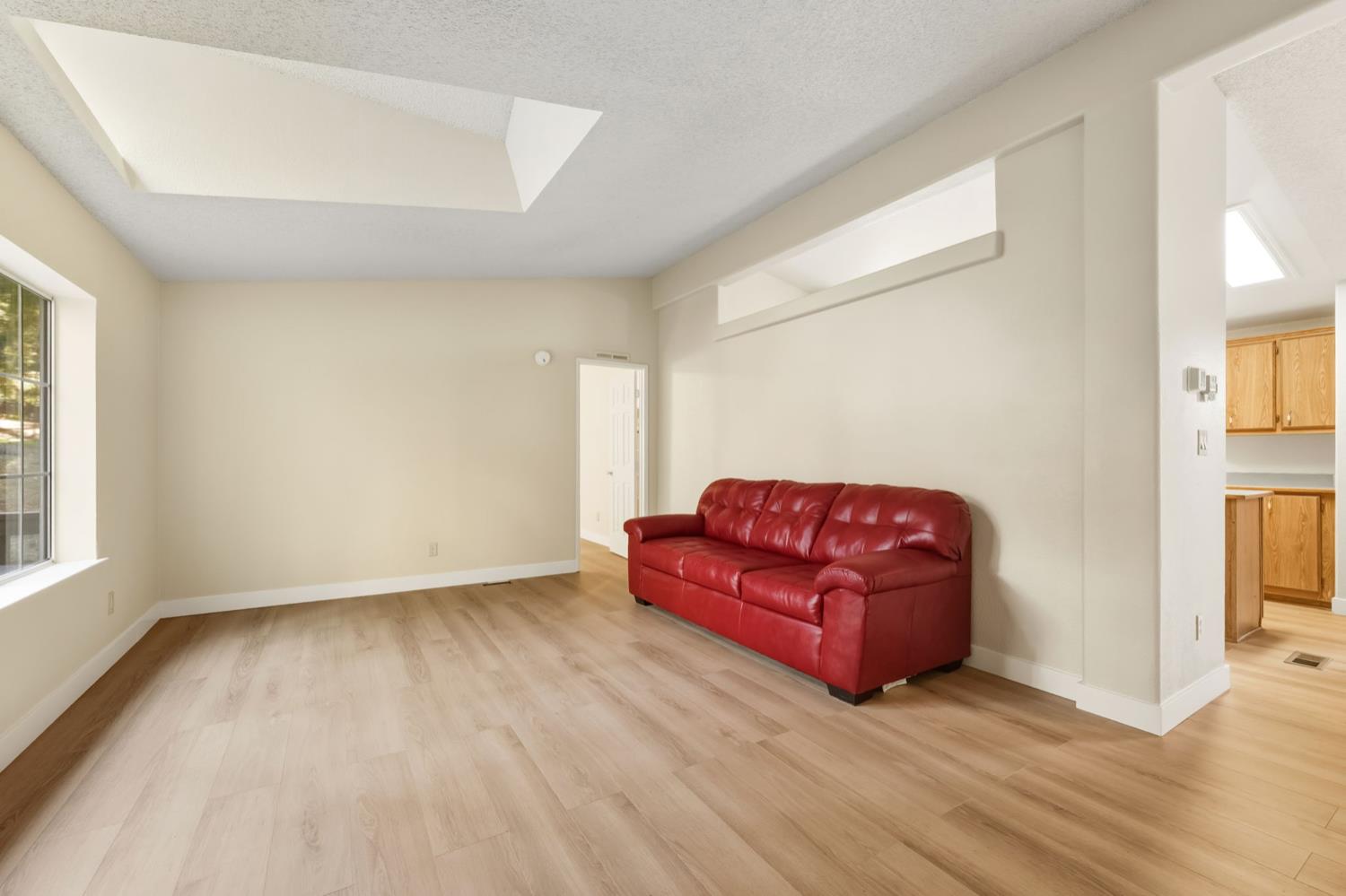 5819 Lynx Trail Pollock Pines, CA 95726 - Photo 4 of 34 a living room with a couch and a window