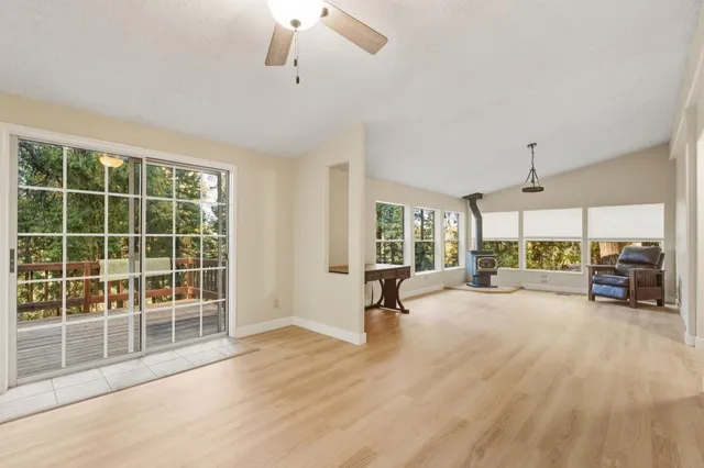 a view of a livingroom with furniture window and outside view