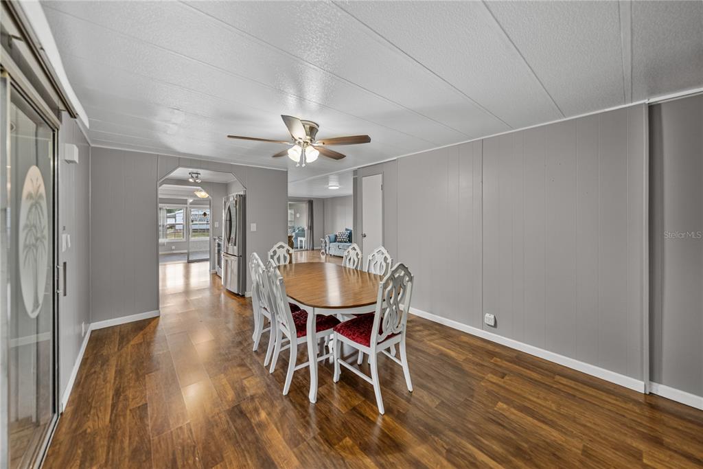 1610 Reynolds Road, Unit 72 Lakeland, FL 33801 - Photo 17 of 25 a view of a dining room with furniture and wooden floor